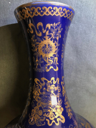 A Chinese gilt-decorated blue-ground bottle vase, Guangxu mark and of the period