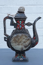 A silver-plated coral, jade and turquoise inlaid ewer and cover, Tibet or Mongolia, 19/20th C.