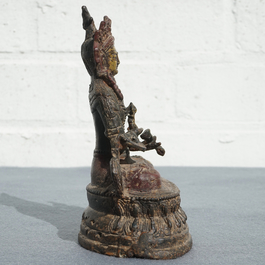 A Chinese lacquered and gilt bronze figure of Buddha Vajrasattva, Ming