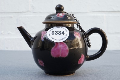 A small Chinese famille rose black-ground teapot and cover, Yongzheng/Qianlong