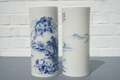 A pair of Chinese blue and white hat stands, 20th C.