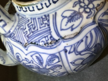 A Chinese blue and white kraak porcelain wine jug and cover with precious objects and flowers, Wanli