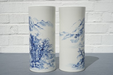 A pair of Chinese blue and white hat stands, 20th C.