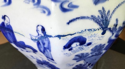 A Chinese blue and white baluster vase with figures in a landscape, Transitional period