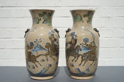 A pair of Chinese Nanking famille verte crackle-glazed vases, 19th C.