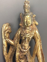 A Chinese gilt bronze figure of Guanyin, Tang or later