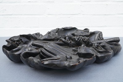 A large Chinese carved wood lotus leaf with various water animals, 19th C.