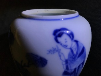 A pair of Chinese blue and white miniature vases and covers or tea caddies, Kangxi