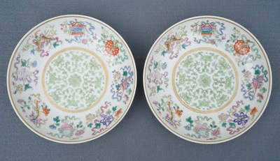 A pair of Chinese famille rose baijixiang plates with Eight Buddhist Emblems, Tongzhi mark and of the period