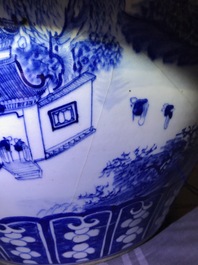 A Chinese blue and white fish bowl with a river landscape, 19th C.