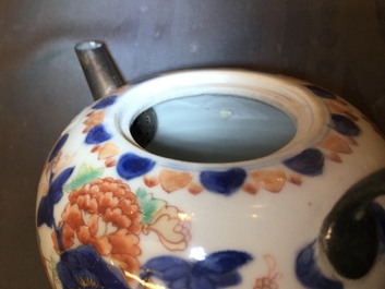 A Chinese famille verte dish, a mandarin bowl, two teapots and three cups, Kangxi and later