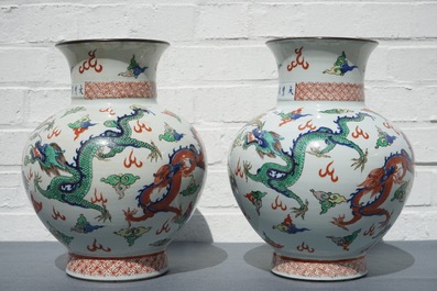 A pair of Chinese wucai dragon vases, Wanli mark, 19th C.
