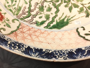 A Chinese famille verte dish, a mandarin bowl, two teapots and three cups, Kangxi and later