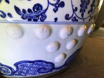 A Chinese blue and white 'lotus scroll' garden seat, Qianlong