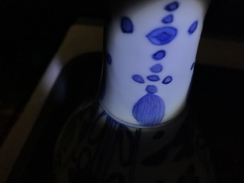 A Chinese blue and white landscape jug and a bottle vase with taoist symbols, Transitional period and Wanli