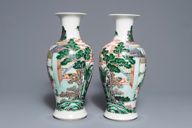 A pair of Chinese famille verte 'silk production' vases, 19th C.