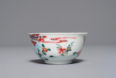 A Chinese famille rose 'Romance of the Western chamber' cup and saucer, Yongzheng/Qianlong