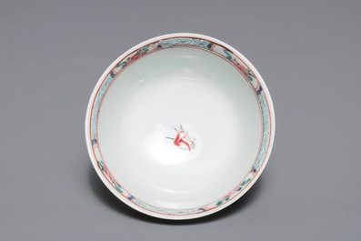 A Chinese famille rose 'Romance of the Western chamber' cup and saucer, Yongzheng/Qianlong