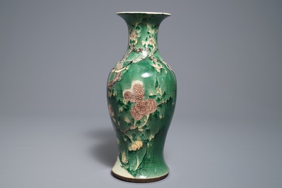 A Chinese famille verte vase with birds among foliage, 19th C.