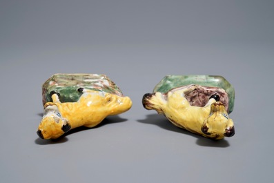 A pair of polychrome Dutch Delft miniatures of dogs, 18th C.