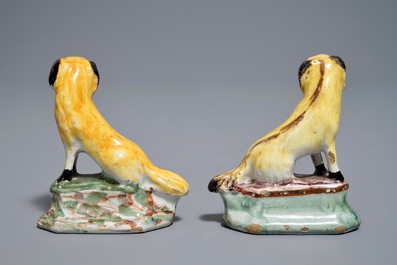 A pair of polychrome Dutch Delft miniatures of dogs, 18th C.