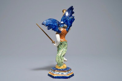 A polychrome Dutch Delft allegorical model of the angel 'Fame', 18th C.