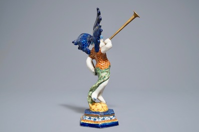 A polychrome Dutch Delft allegorical model of the angel 'Fame', 18th C.