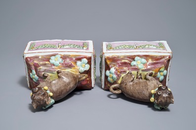 A pair of polychrome Tournai faience pugs, 18th C.