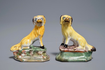 A pair of polychrome Dutch Delft miniatures of dogs, 18th C.