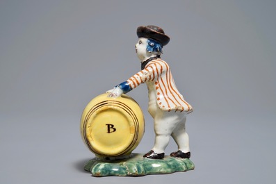 A polychrome Dutch Delft model of a wine merchant, 18th C.