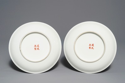 A pair of Chinese famille rose 'bats and peaches' plates, Republic, 20th C.