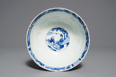 A Chinese blue and white moulded bowl with figurative panels, Xuande mark, Kangxi