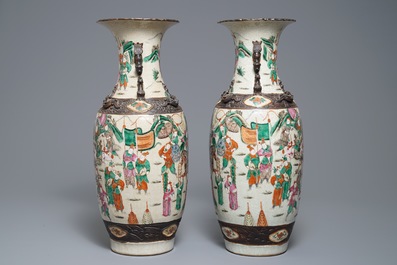 A pair of Chinese Nanking famille rose vases with warriors, 19th C.