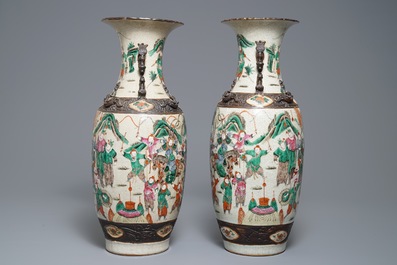 A pair of Chinese Nanking famille rose vases with warriors, 19th C.