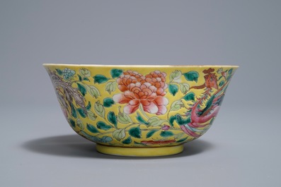 A Chinese famille rose on yellow ground 'phoenix' bowl, Qianlong mark, 19th C.