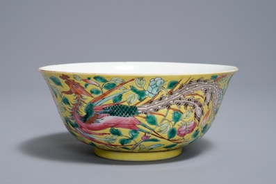 A Chinese famille rose on yellow ground 'phoenix' bowl, Qianlong mark, 19th C.