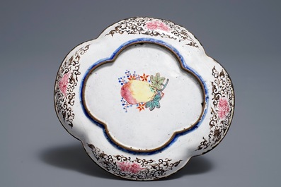 A Chinese Canton enamel quatrefoil 'Europeans' dish, Qianlong