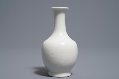 A Chinese blanc de Chine bottle vase with incised anhua design, ca. 1900