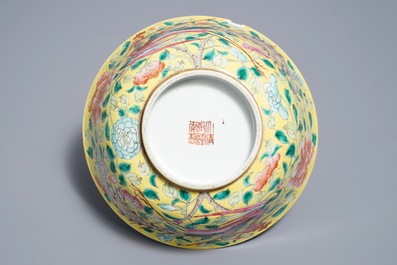 A Chinese famille rose on yellow ground 'phoenix' bowl, Qianlong mark, 19th C.