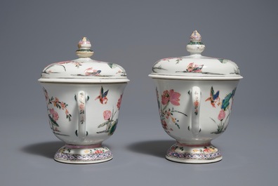 A pair of Chinese famille rose cups and covers with lotus flowers and ducks, Yongzheng