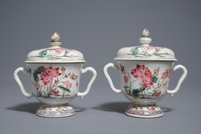 A pair of Chinese famille rose cups and covers with lotus flowers and ducks, Yongzheng