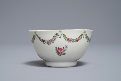 A Chinese famille rose 'European subject' cup and saucer, Qianlong