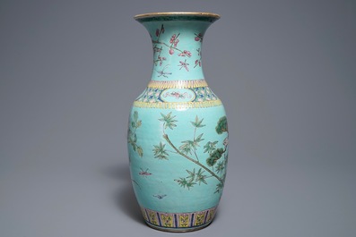 A Chinese famille rose turquoise ground vase, 19th C.