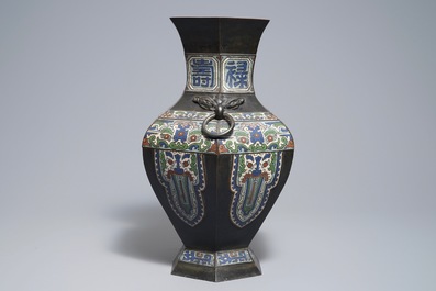 An archaic Chinese bronze and champlev&eacute; enamel vase, 19th C.