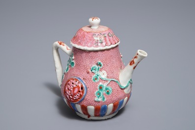 A Chinese famille rose relief-moulded teapot and cover, Yongzheng