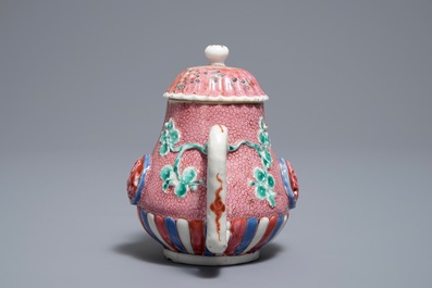 A Chinese famille rose relief-moulded teapot and cover, Yongzheng