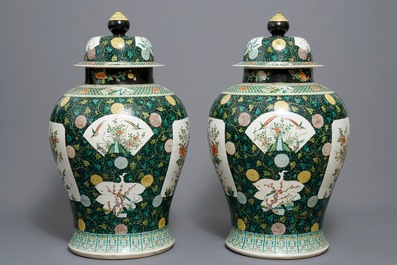 A pair of large Chinese famille noire vases and covers, 19/20th C.