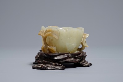 A Chinese lotus-shaped jade libation cup on stand, 18/19th C.