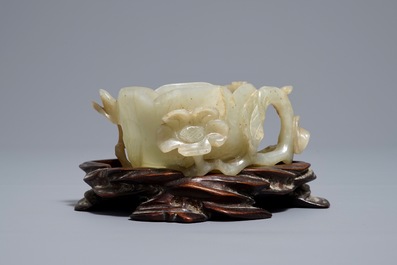 A Chinese lotus-shaped jade libation cup on stand, 18/19th C.