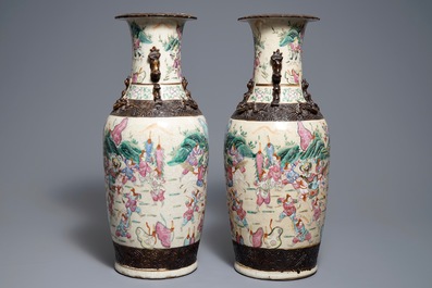 A pair of Chinese Nanking famille rose crackle-glazed vases with warriors, 19th C.